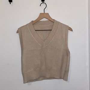tan sweater vest